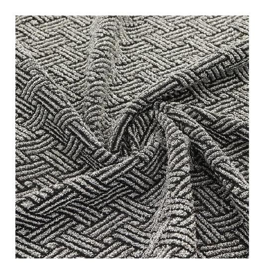 Tejido de punto jacquard de filigrana