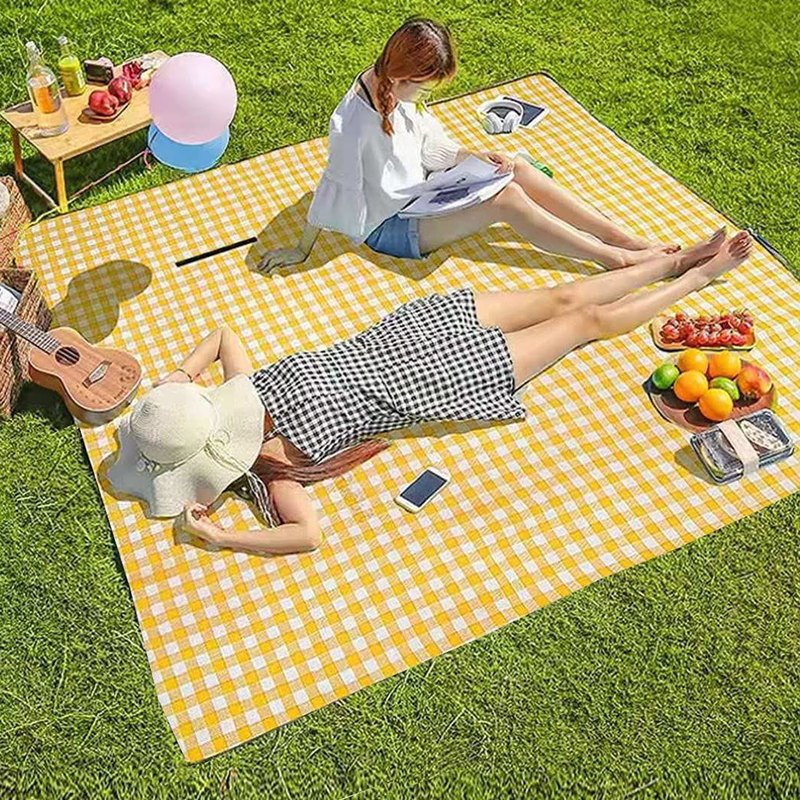 Manta de picnic sobre el césped
