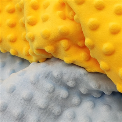 Tela coral de lunares Minky Dott