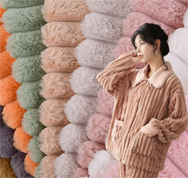 Tela de piel sintética de conejo a rayas