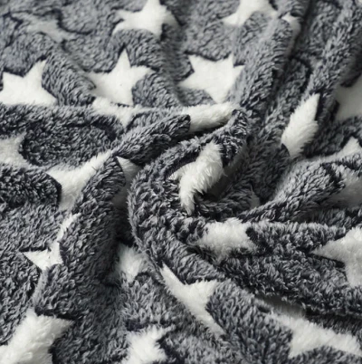 Tela de franela con estampado de estrellas