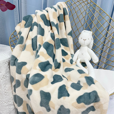 Manta de coral con estampado de vacas