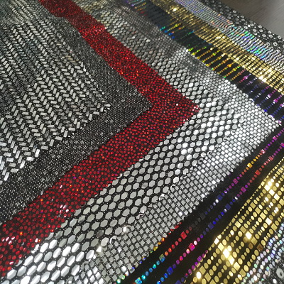 Tela de lentejuelas de oro espumoso