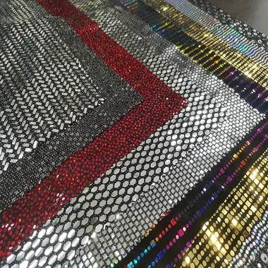 Tela de lentejuelas de oro espumoso